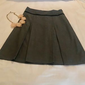 The limited, grey pleated skirt size xs